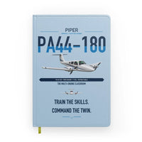 Thumbnail for Piper PA-44-180 Seminole design on light blue notebook