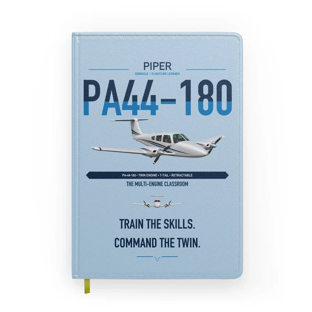 Piper PA-44-180 Seminole design on light blue notebook
