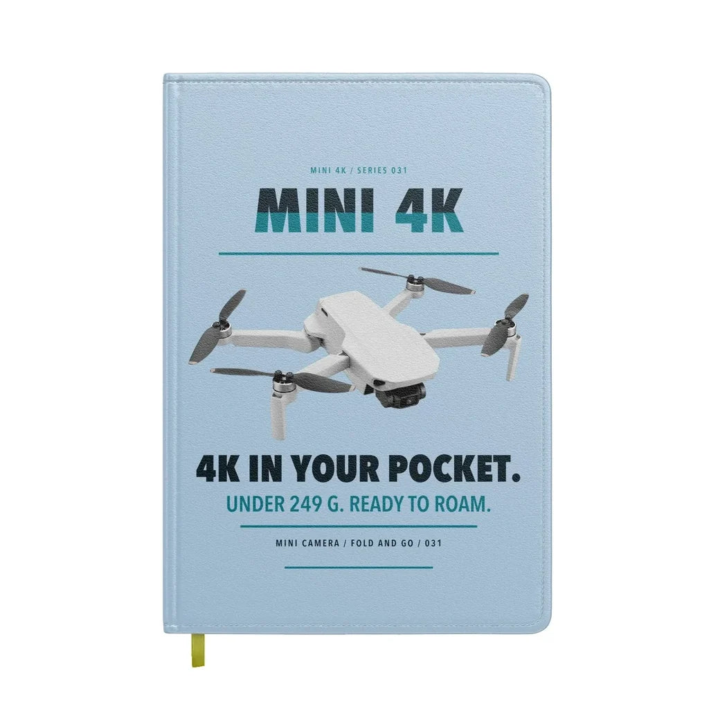DJI Mini 4K design on light blue notebook