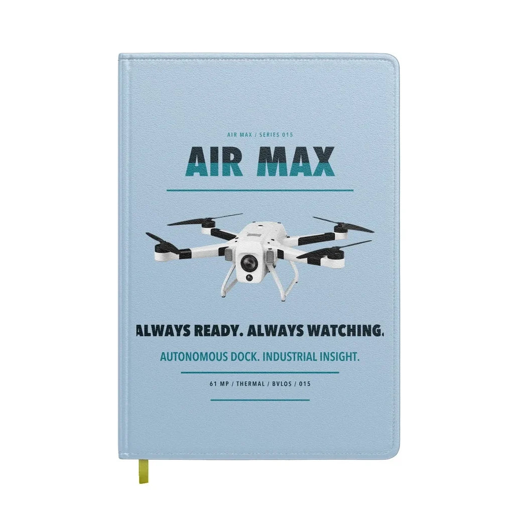 Percepto Air Max design on light blue notebook