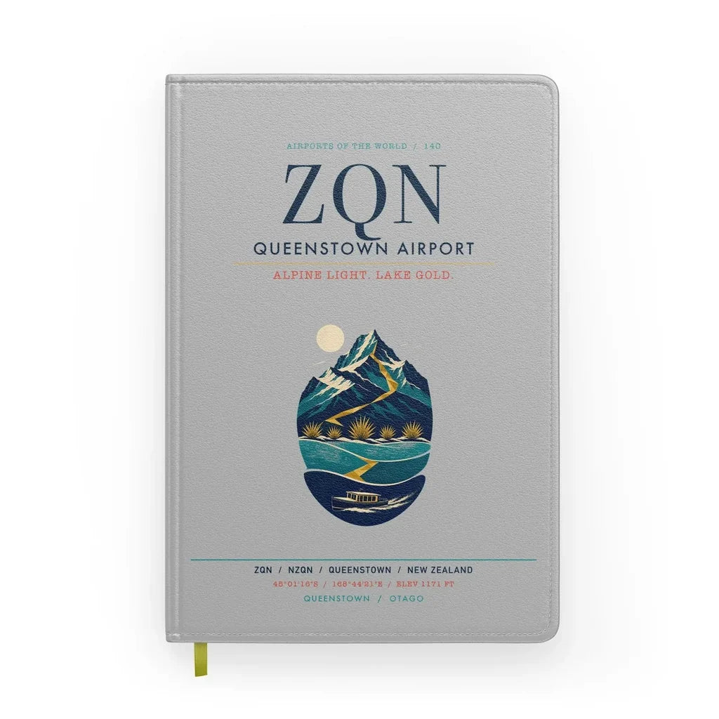 Queenstown Airport (ZQN) design on light gray notebook