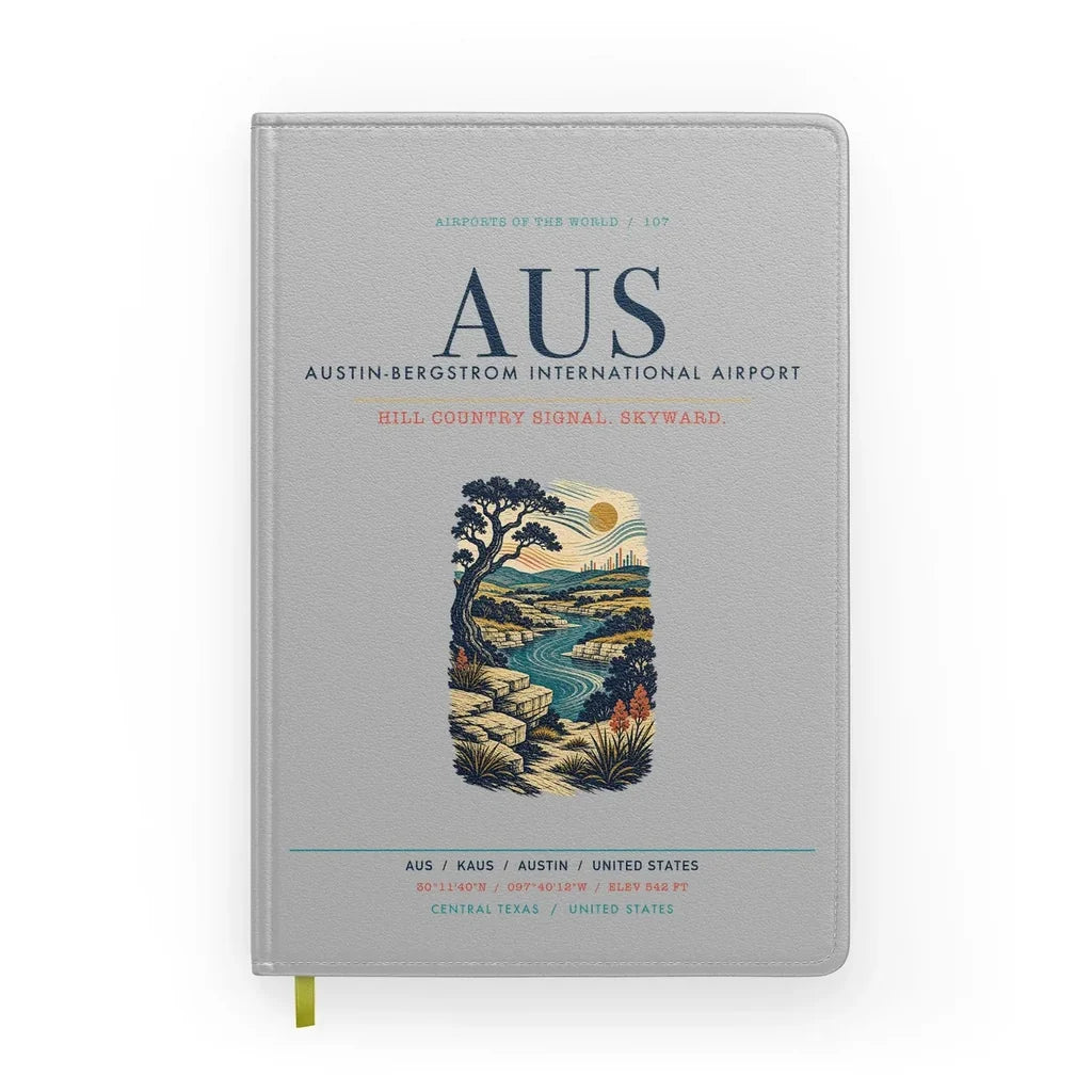 Austin-Bergstrom International Airport (AUS) design on light gray notebook