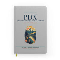 Thumbnail for Portland International Airport (PDX) design on light gray notebook