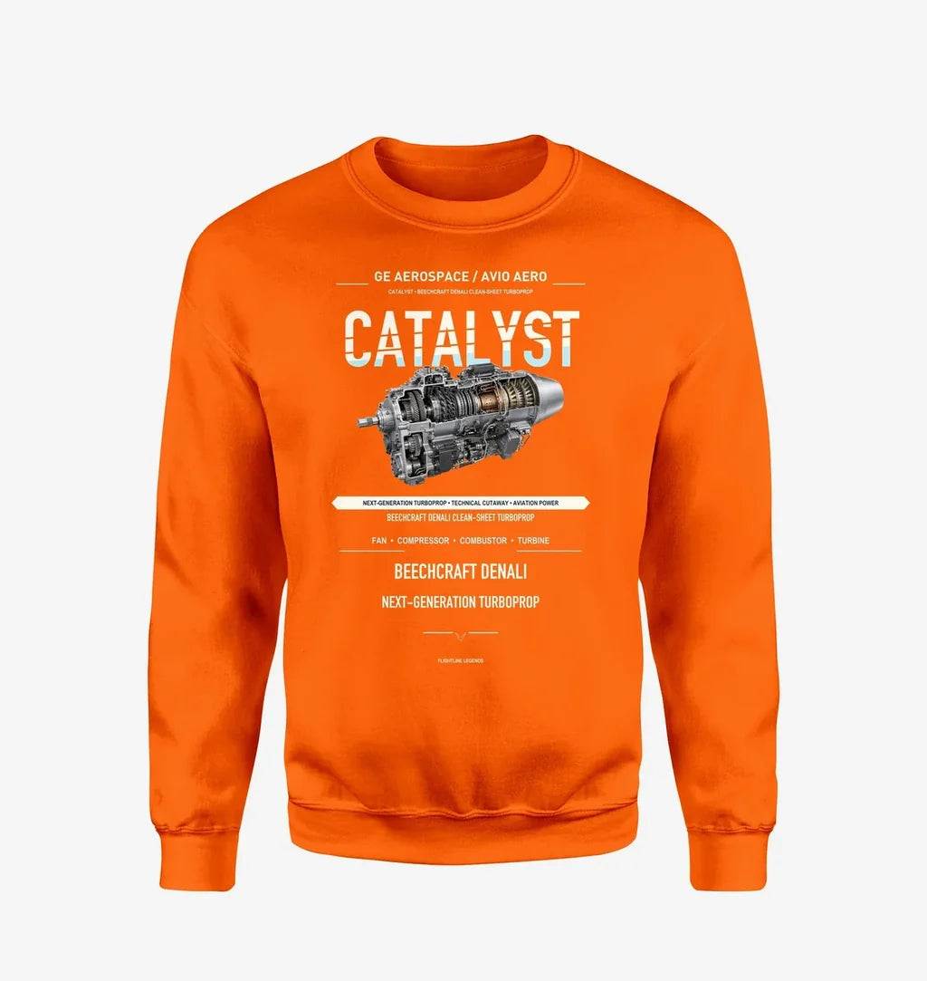 CATALYST design on orange sweatshirt