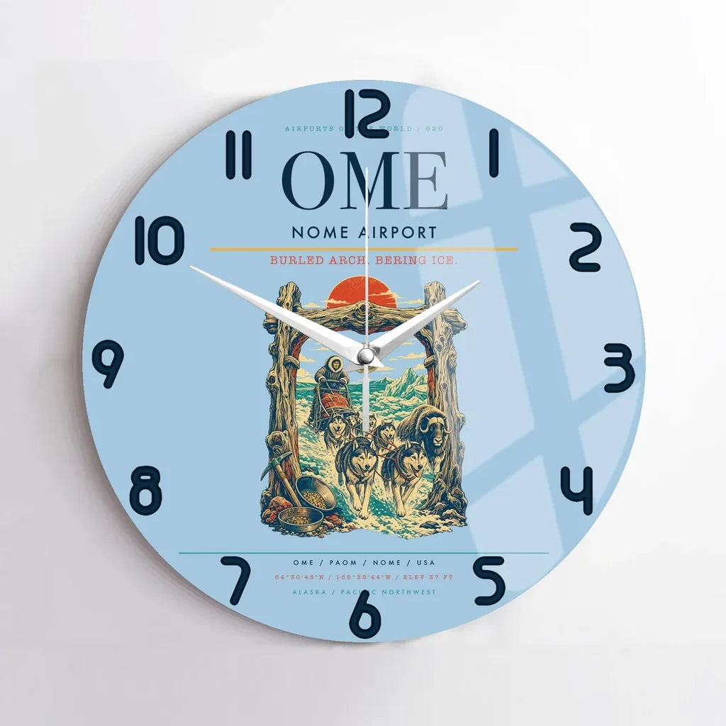 Nome Airport (OME) design on light blue no frame wall clock