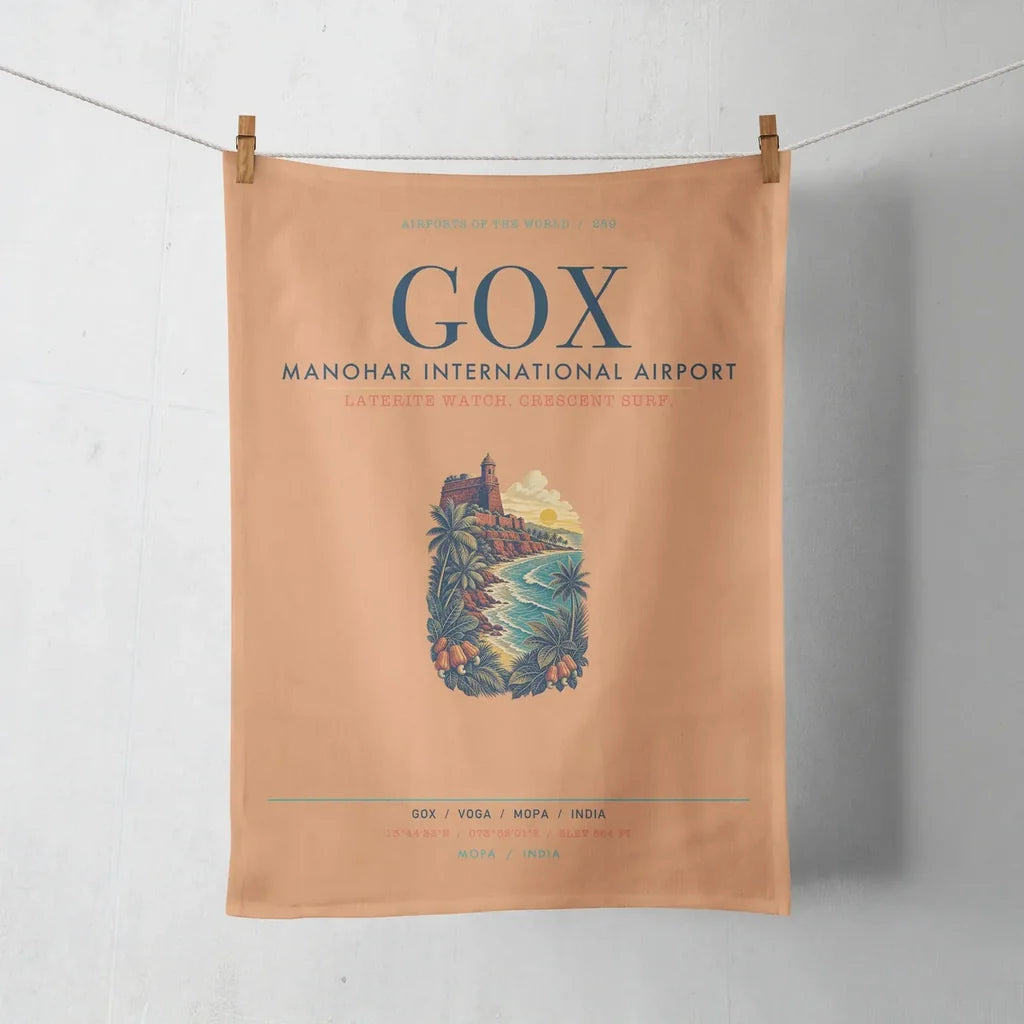Manohar International Airport Mopa (GOX) design on orange towel