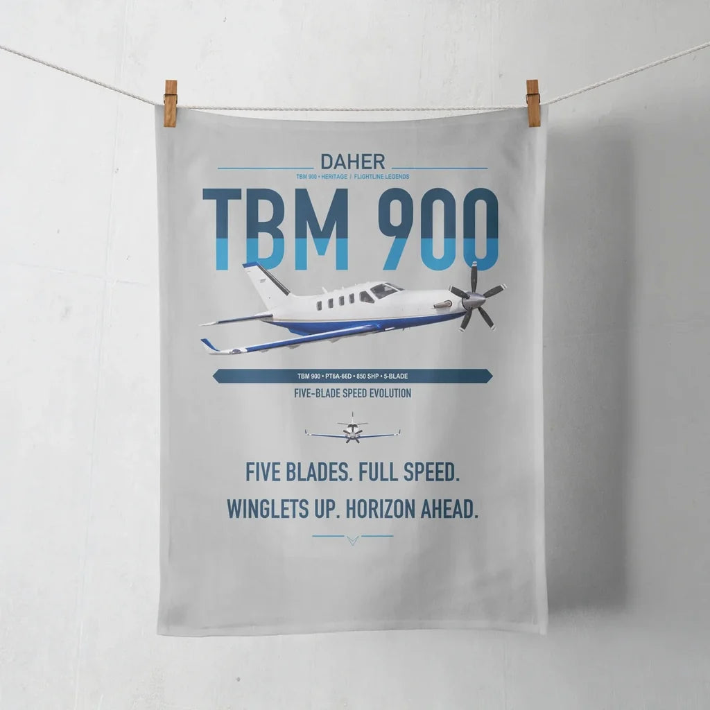 Daher TBM 900 design on light gray towel