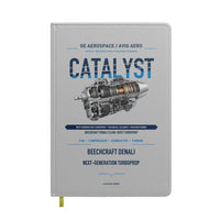 Thumbnail for CATALYST design on light gray notebook