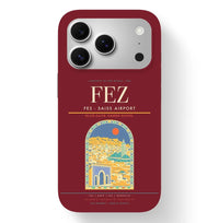 Thumbnail for Fez Airport (FEZ) design on dark red iPhone 17 Pro MagSafe case