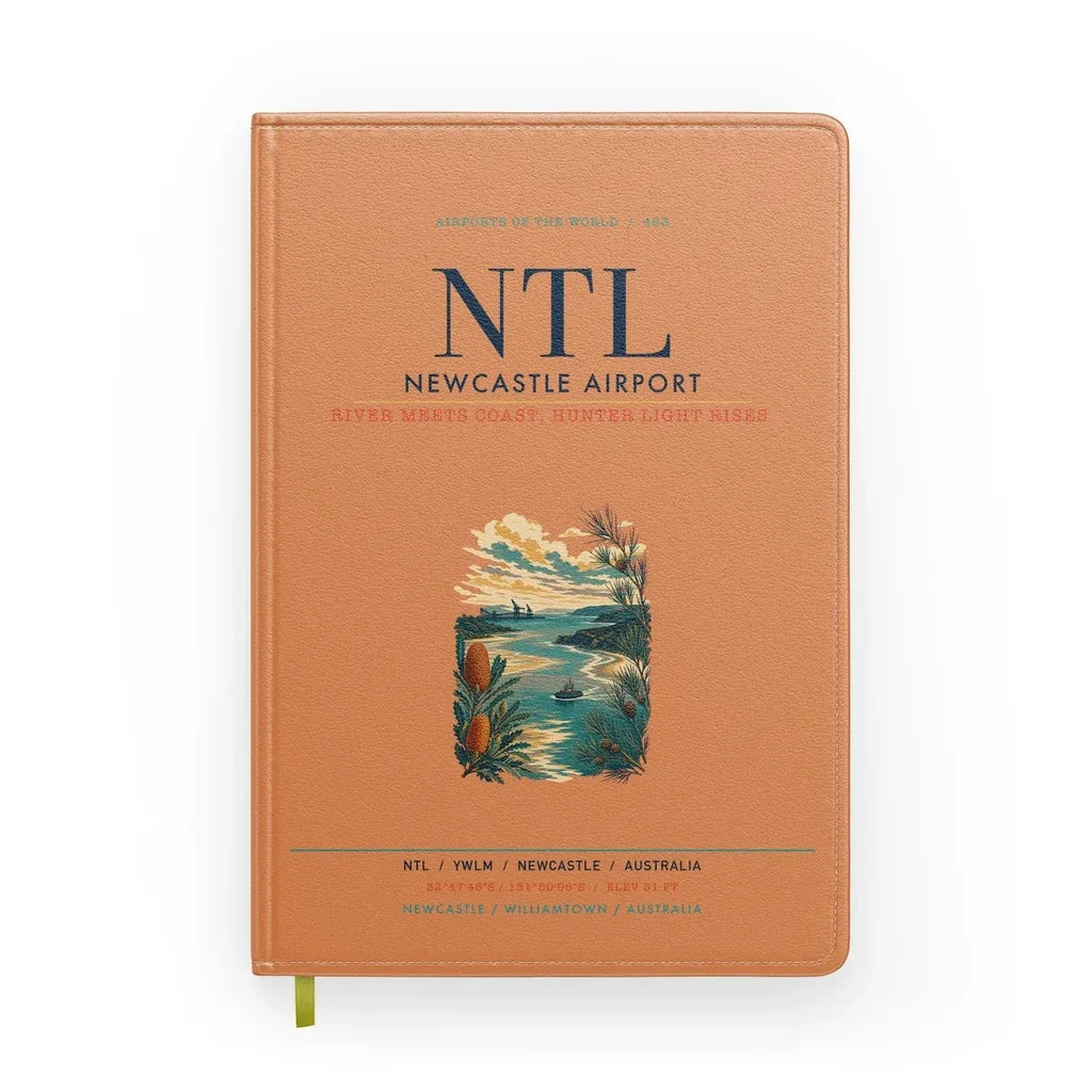Newcastle Airport (NTL) design on orange notebook