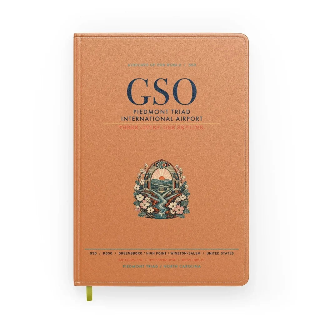 Piedmont Triad International Airport (GSO) design on orange notebook