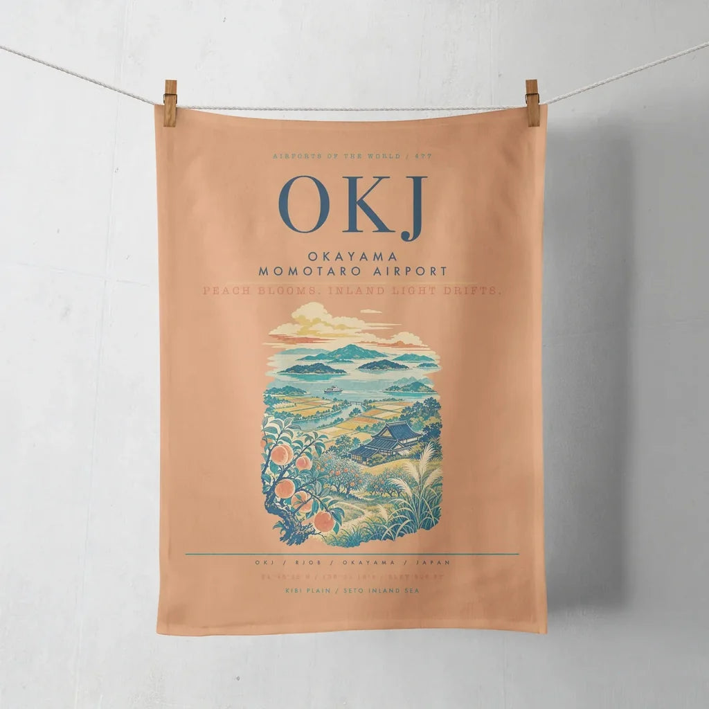 Okayama Momotaro Airport (OKJ) design on orange towel