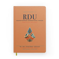 Thumbnail for Raleigh-Durham International Airport (RDU) design on orange notebook
