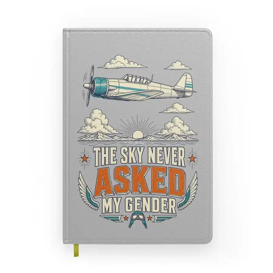The Sky Never Asked My Gender design on light gray notebook