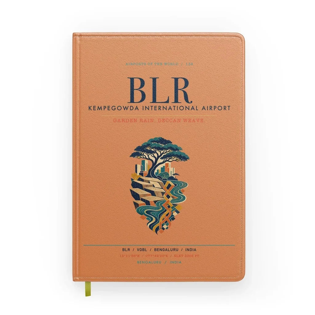 Kempegowda International Airport Bengaluru (BLR) design on orange notebook