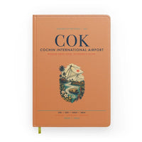 Thumbnail for Cochin International Airport Kochi (COK) design on orange notebook