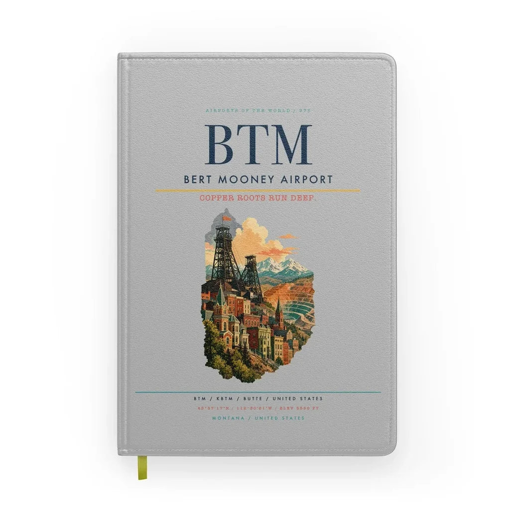 Bert Mooney Airport (BTM) design on light gray notebook