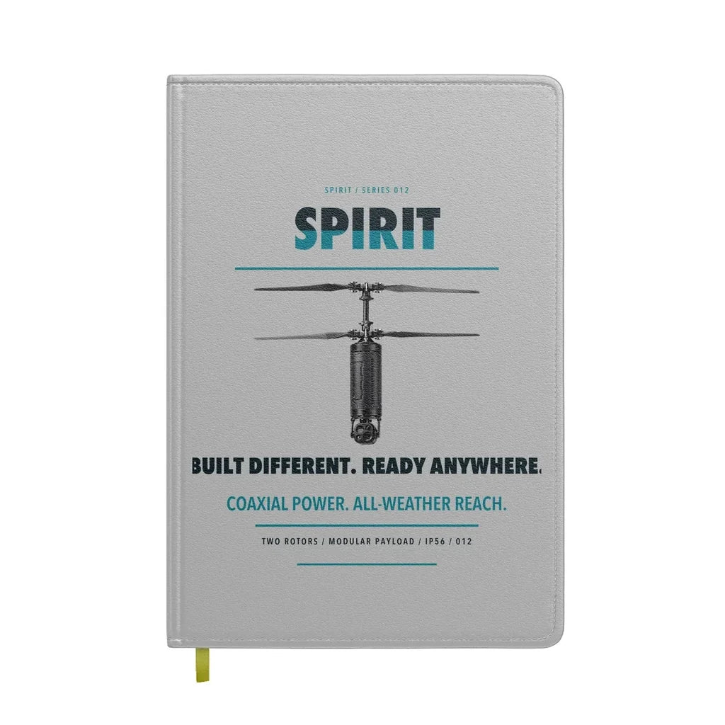 Ascent AeroSystems Spirit design on light gray notebook
