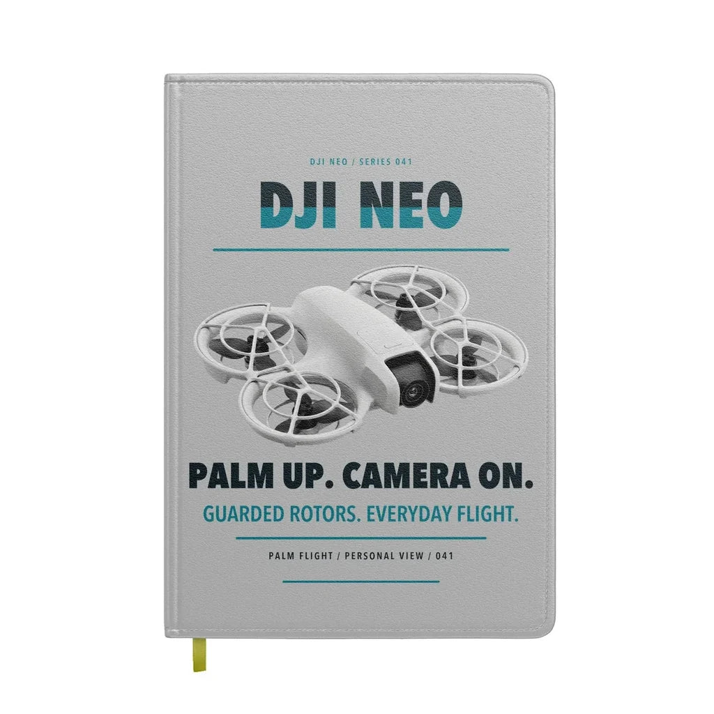 DJI Neo design on light gray notebook