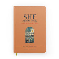 Thumbnail for Shenyang Taoxian International Airport (SHE) design on orange notebook