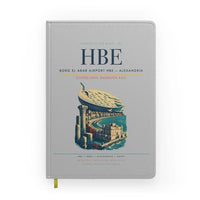 Thumbnail for Borg El Arab Airport (HBE) design on light gray notebook