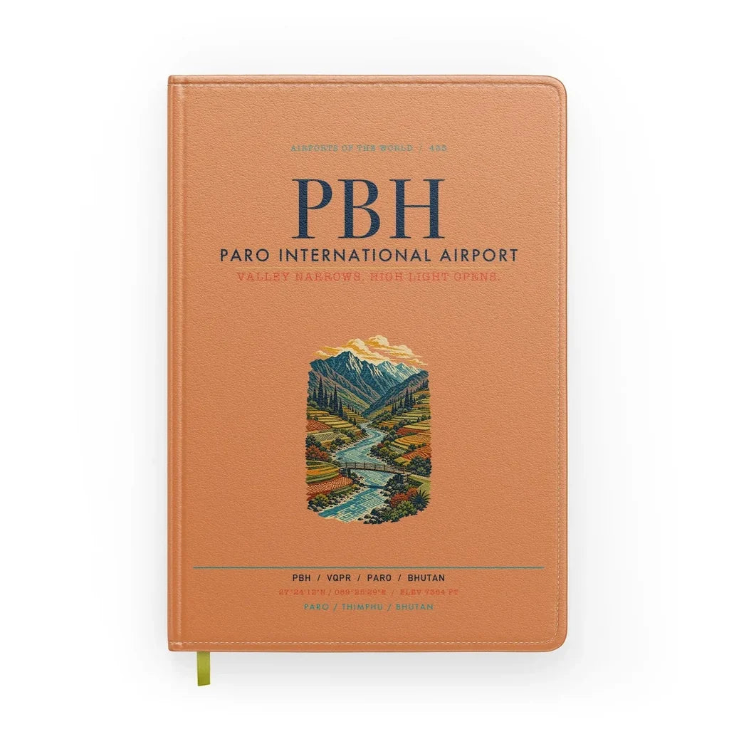 Paro International Airport (PBH) design on orange notebook