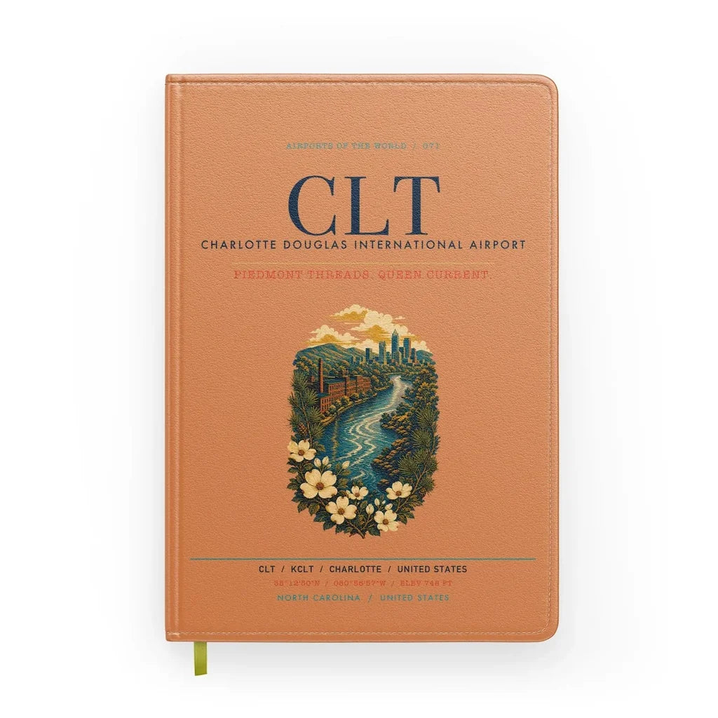 Charlotte Douglas International Airport (CLT) design on orange notebook