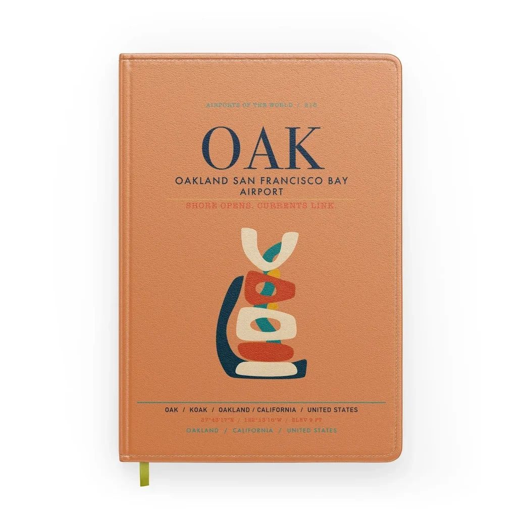 Oakland San Francisco Bay Airport (OAK) design on orange notebook