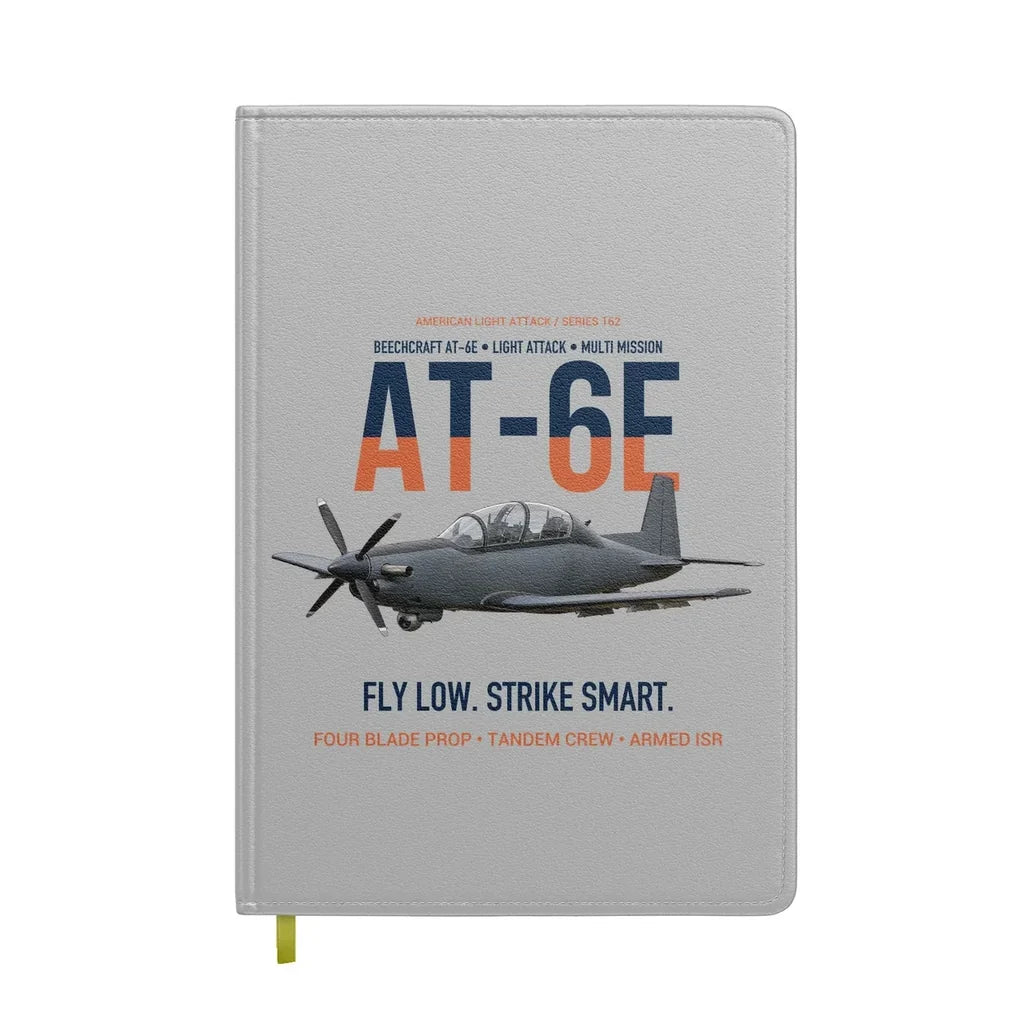 AT-6E Wolverine Light Attack design on light gray notebook