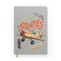 Thumbnail for Years Served Stories Airborne design on light gray notebook