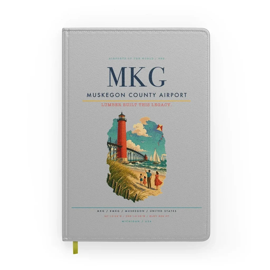Muskegon County Airport (MKG) design on light gray notebook