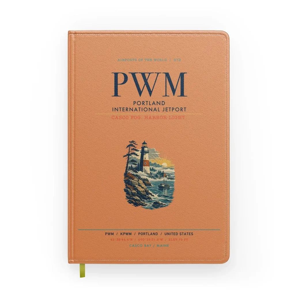 Portland International Jetport (PWM) design on orange notebook