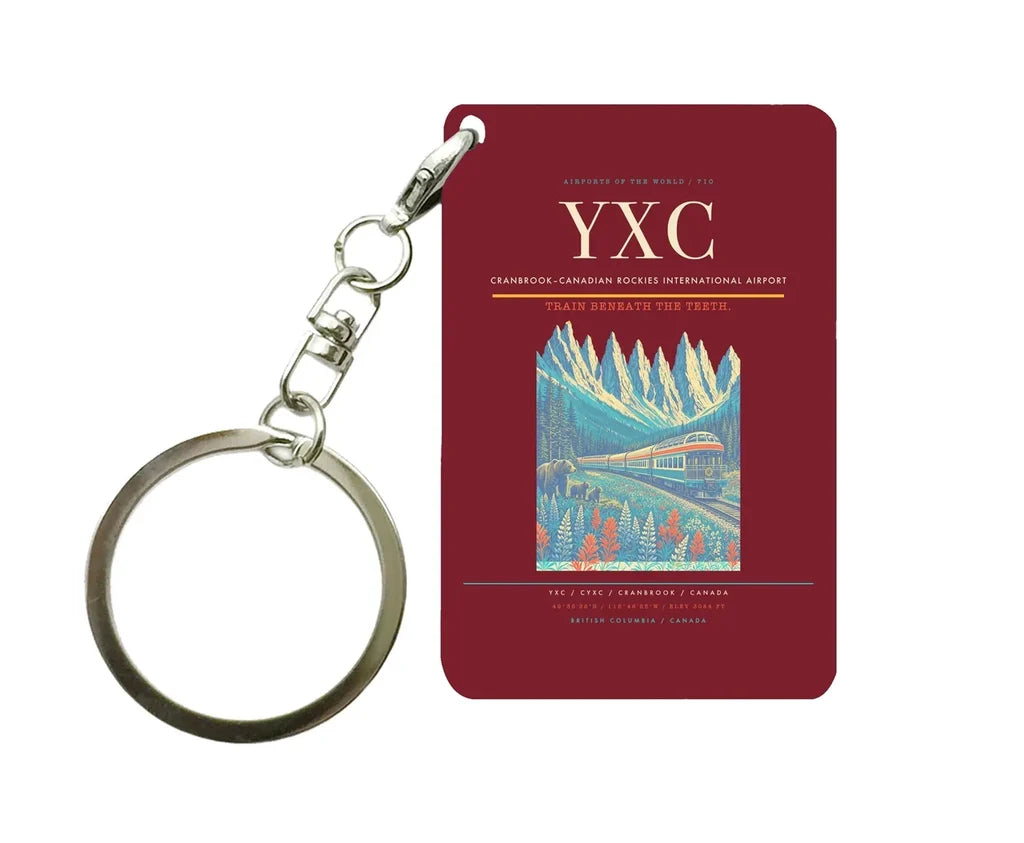 Cranbrook–Canadian Rockies International Airport (YXC) design on dark red key chain