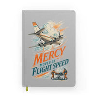 Thumbnail for Mercy Moves At Flight Speed design on light gray notebook