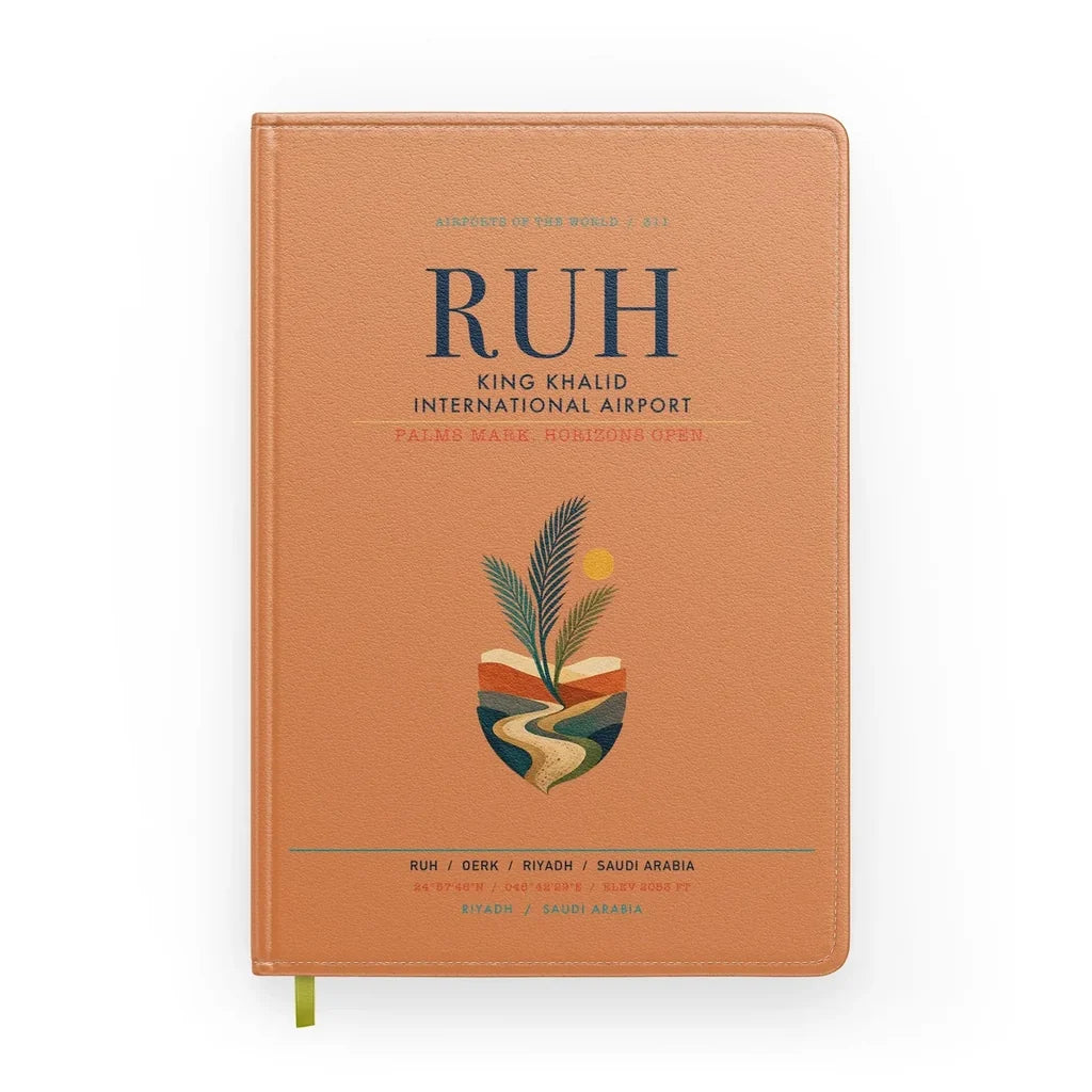 King Khalid International Airport (RUH) design on orange notebook