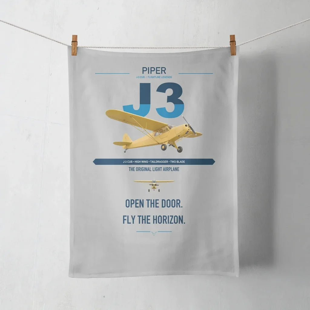 Piper J-3 Cub design on light gray towel