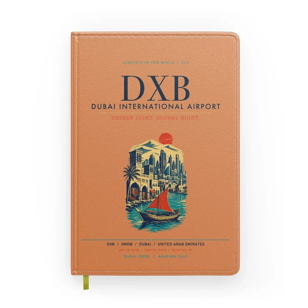 Dubai International Airport (DXB) design on orange notebook