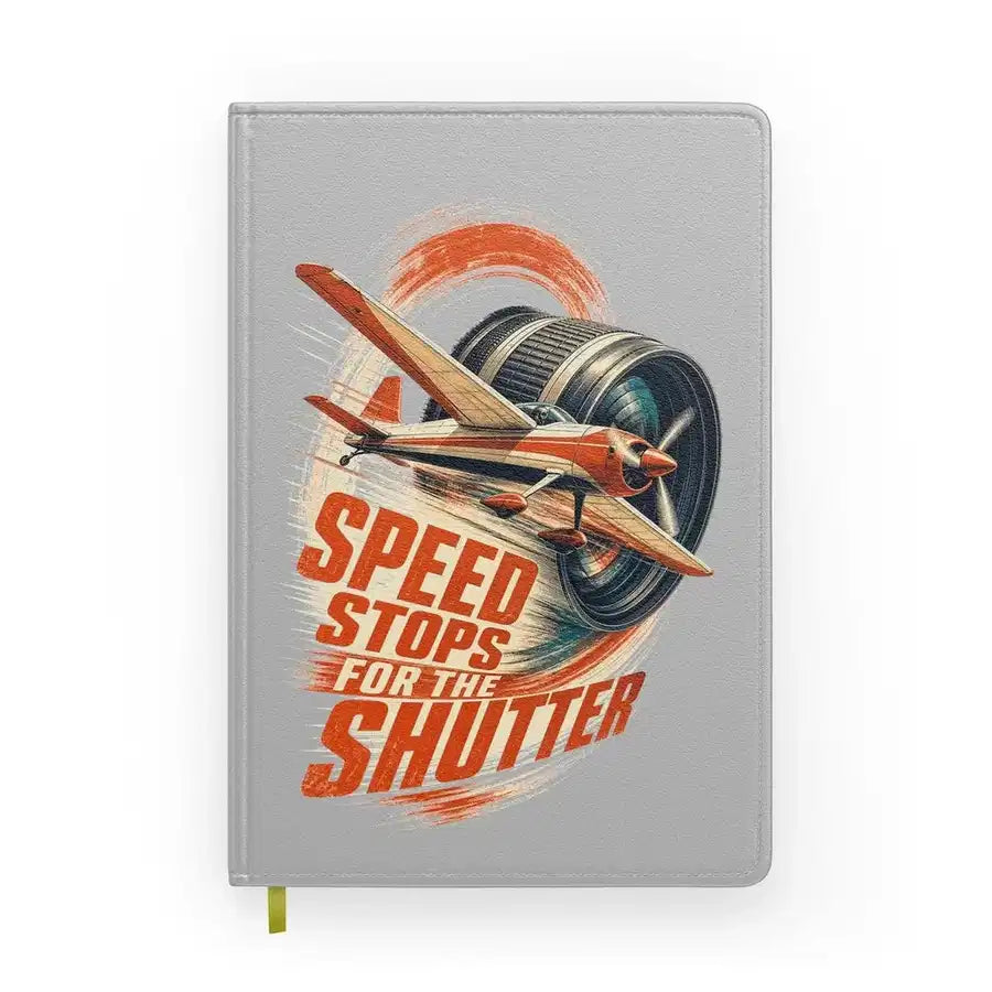 Speed Stops For The Shutter design on light gray notebook
