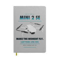 Thumbnail for DJI Mini 2 SE design on light gray notebook