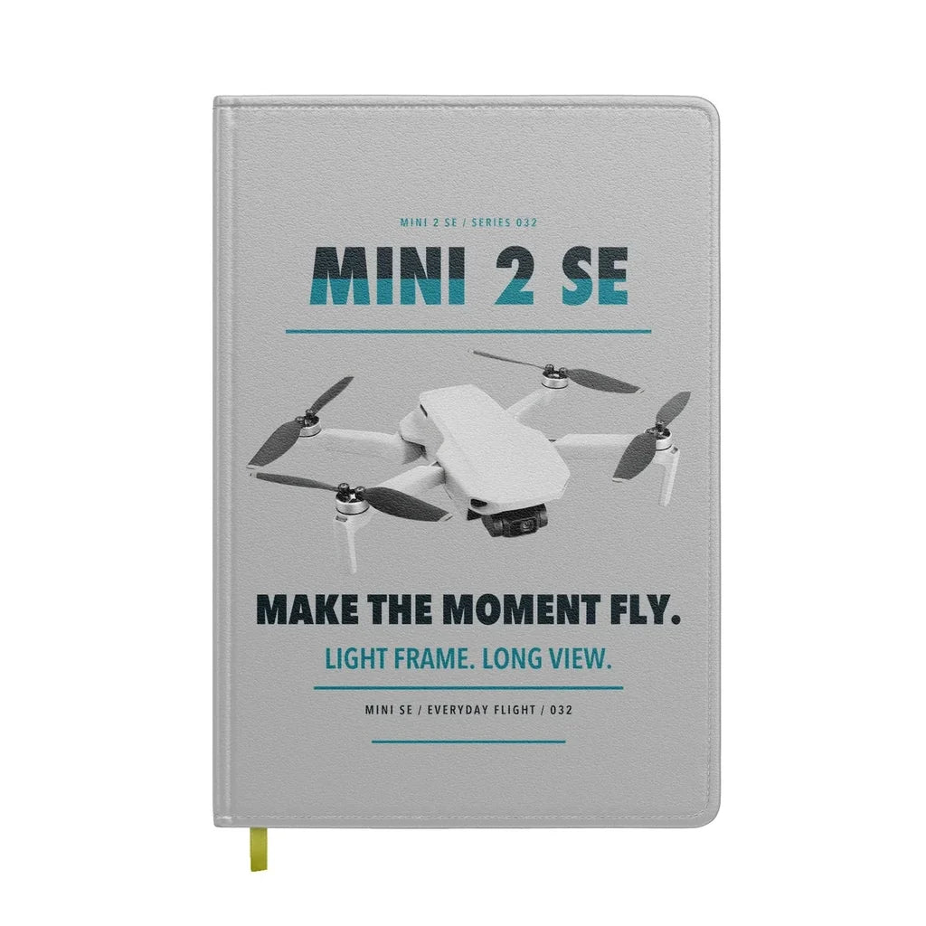 DJI Mini 2 SE design on light gray notebook