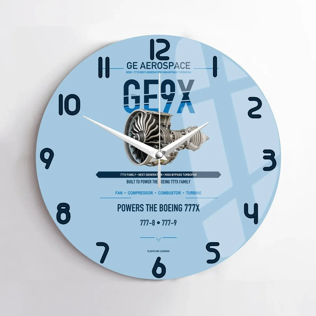 GE9X design on light blue no frame wall clock