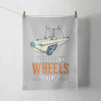 Thumbnail for Floats Down Wheels Up design on light gray towel