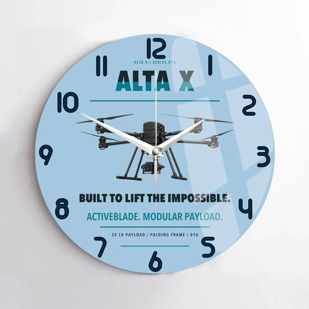 Freefly Alta X design on light blue no frame wall clock