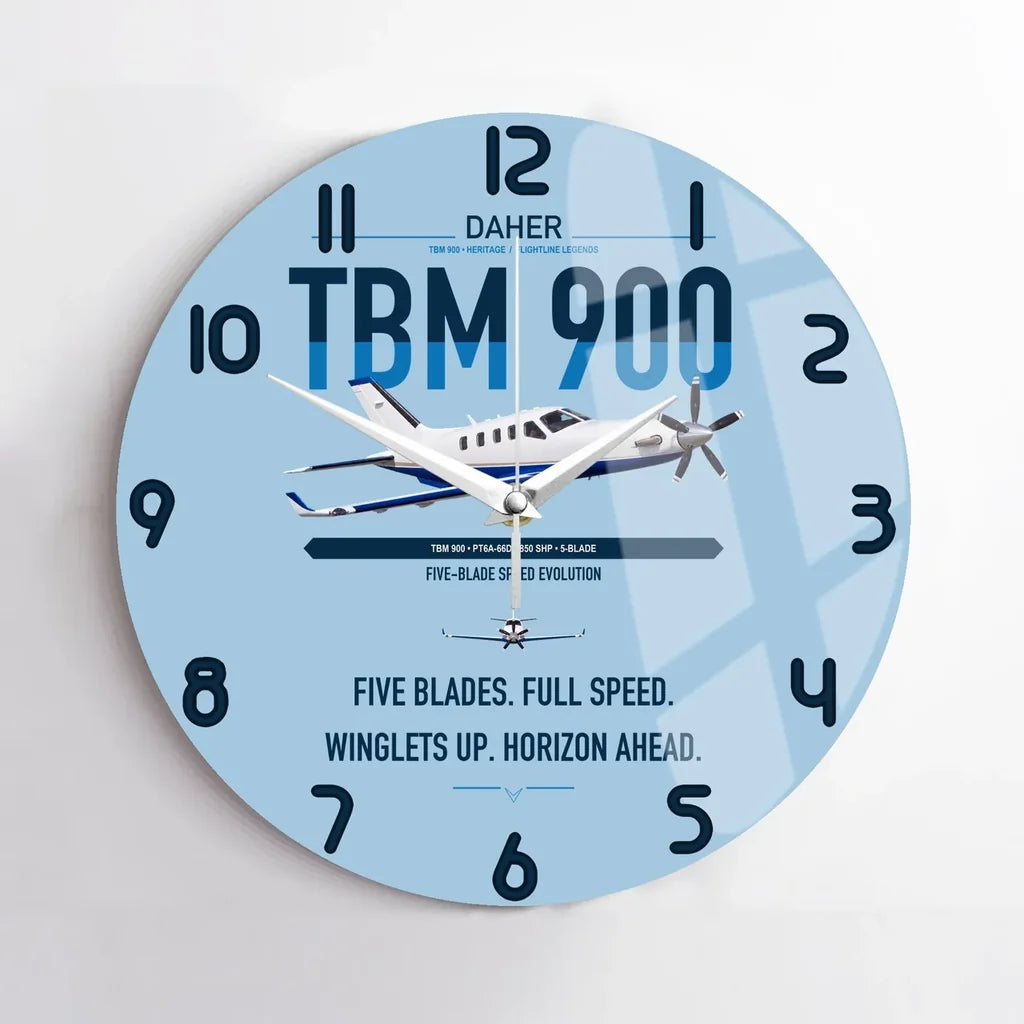 Daher TBM 900 design on light blue no frame wall clock