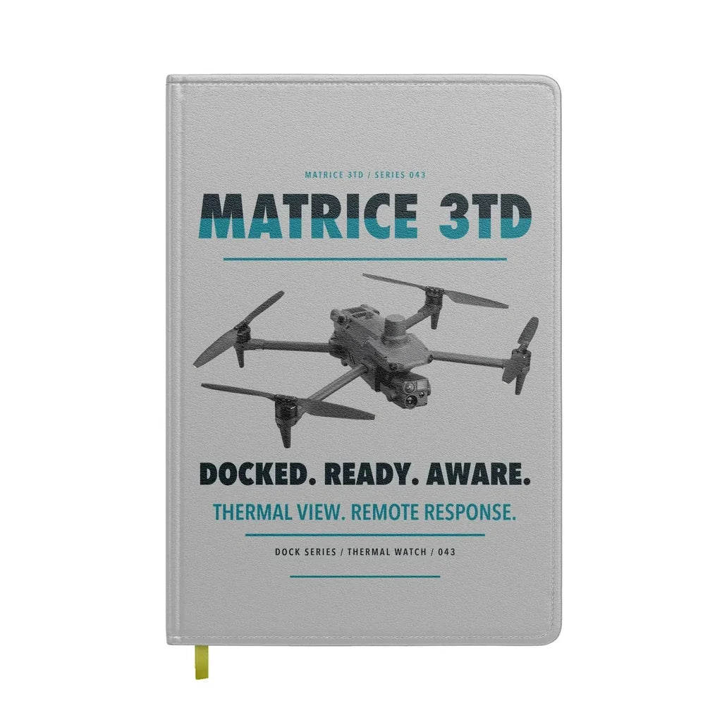 DJI Matrice 3TD design on light gray notebook