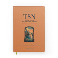 Thumbnail for Tianjin Binhai International Airport (TSN) design on orange notebook