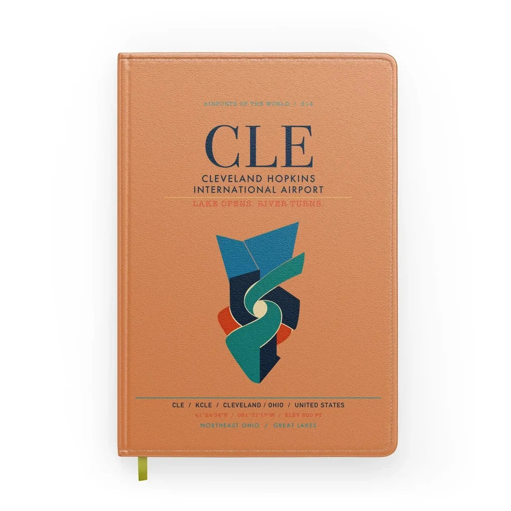 Cleveland Hopkins International Airport (CLE) design on orange notebook