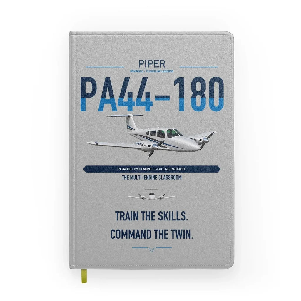Piper PA-44-180 Seminole design on light gray notebook