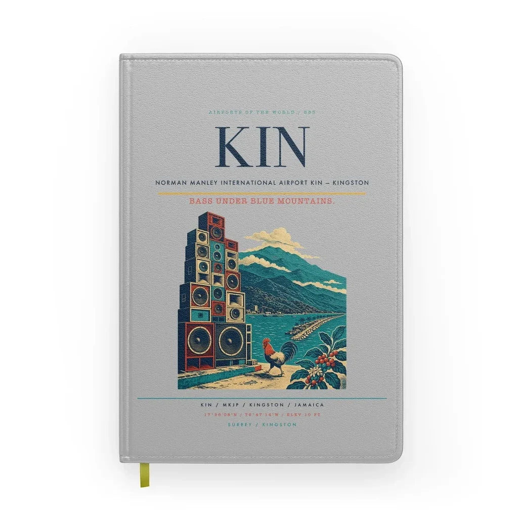 Norman Manley International Airport (KIN) design on light gray notebook