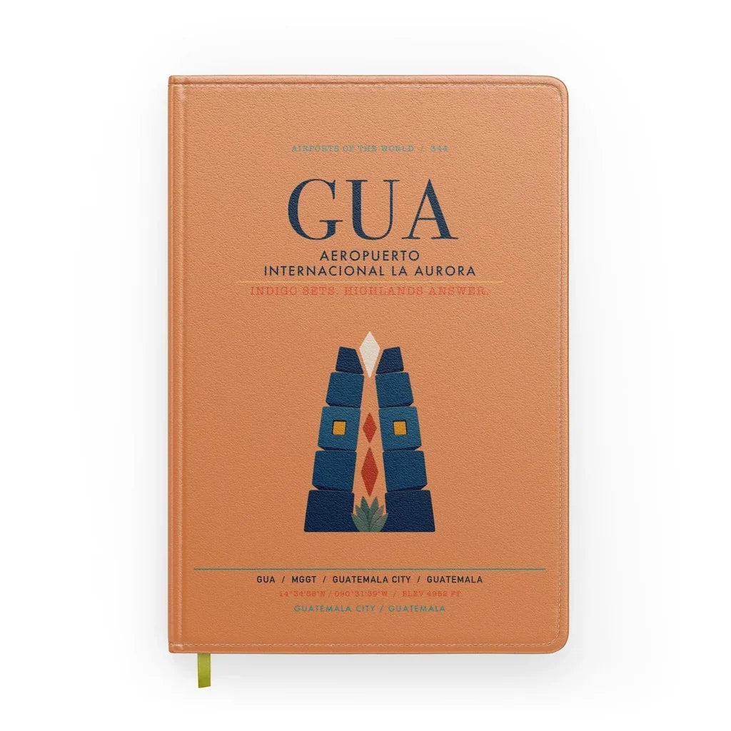 Aeropuerto Internacional La Aurora (GUA) design on orange notebook